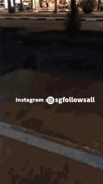 a blurry picture of a building with the words instagram sgfollowsall at the top