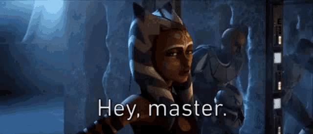 ahsoka tano from star wars is standing in a dark room and talking to someone .