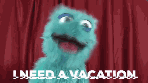 a blue puppet is saying i need a vacation
