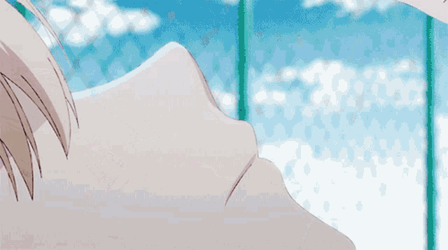 a man and a woman are kissing in a cartoon