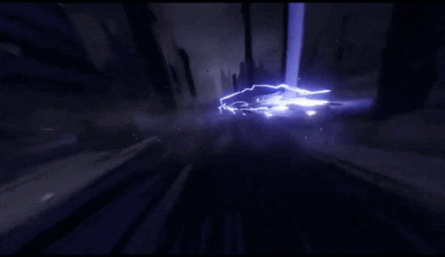a person is being struck by a lightning bolt in the dark
