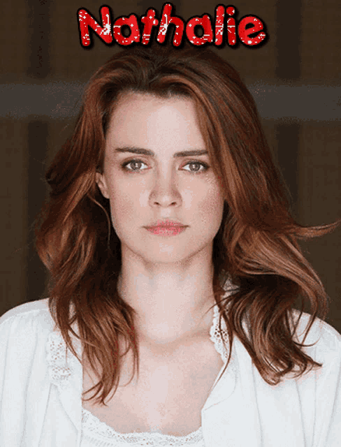 a woman with red hair and the name nathalie on the top