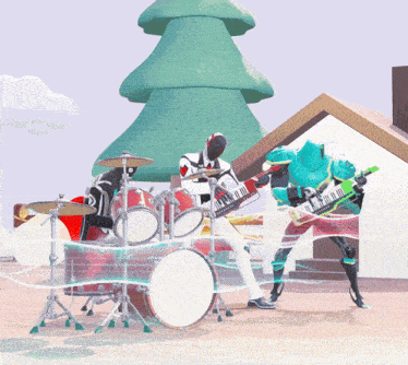 a man playing drums and another man playing a keyboard in front of a christmas tree