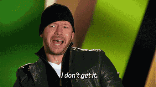 a man wearing a black hat and a leather jacket is saying i don 't get it
