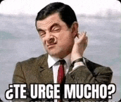 mr bean is wearing a suit and tie and making a funny face with the words `` te urge mucho '' written on it .