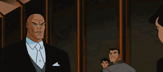 a man in a suit and tie is standing next to a woman