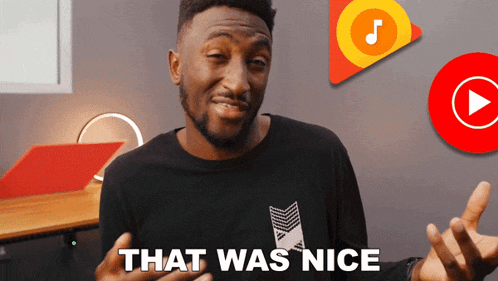 a man wearing a black shirt that says that was nice on it