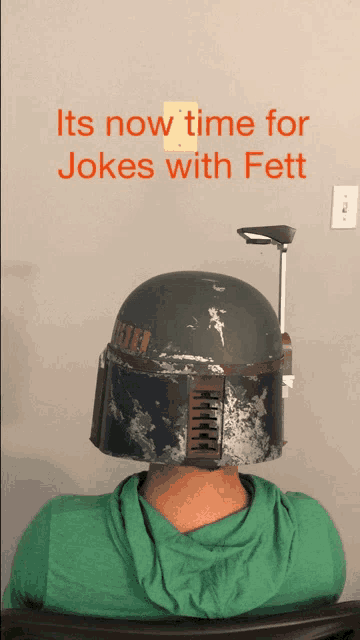 a man wearing a boba fett helmet on his head with the words " its now time for jokes with fett " above him