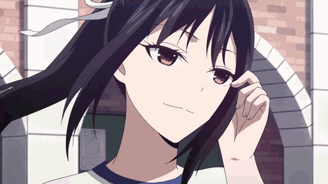 a girl with long black hair and red eyes is looking at the camera