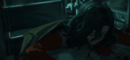 a woman is laying on the floor with blood on the floor