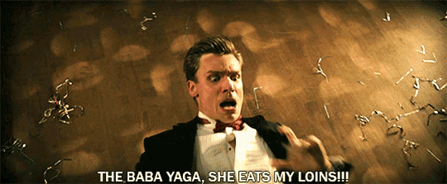 a man in a tuxedo says " the baba yaga she eats my loins !!! "