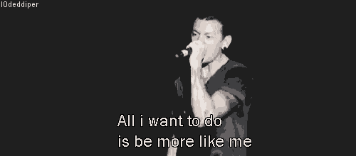 a man singing into a microphone with the words all i want to do is be more like me below him