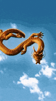 a golden dragon is flying through a blue sky with white clouds