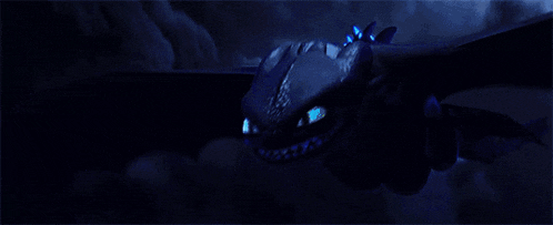 toothless from how to train your dragon is surrounded by blue lightning and smoke .
