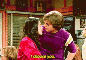 a man and a woman are kissing and the man is saying i choose you