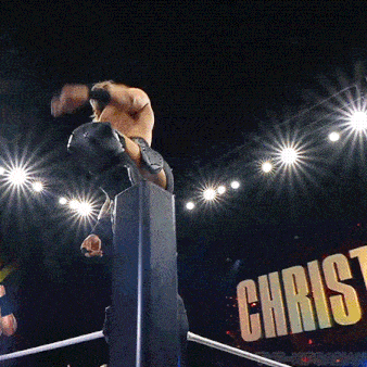 a wrestling ring with the word christ on the wall