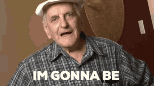 an elderly man wearing a plaid shirt and a white hat says im gonna be