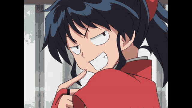 a close up of a girl making a funny face with her finger on her chin
