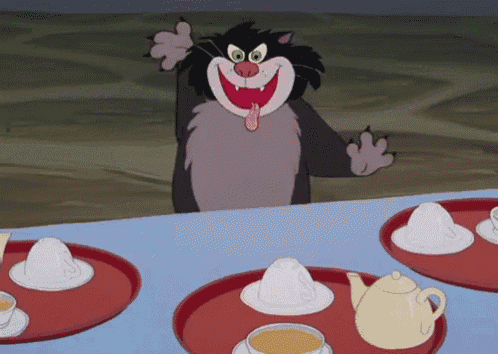 a cartoon cat is sitting at a table with cups and teapots on it