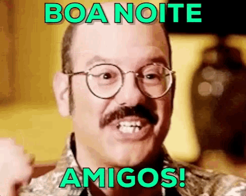 a man with glasses and a mustache is making a funny face and saying boa noite amigos .