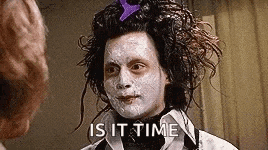 a woman with a face mask on her face is looking at a man .