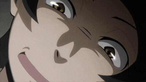 a close up of a person 's face with their eyes looking up