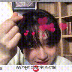 a person with hearts in their hair and the words sakuya viendo a emi