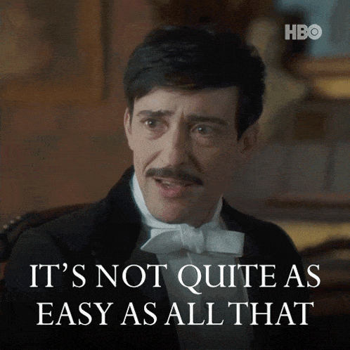 a man in a tuxedo with a mustache says it 's not quite as easy as all that