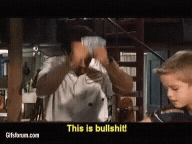 a man in a white shirt is holding a bunch of money in front of his face and says " this is bullshit "