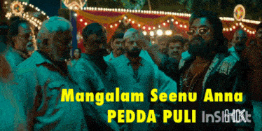 a group of men are standing in front of a sign that says mangalam seenu anna pedda puli