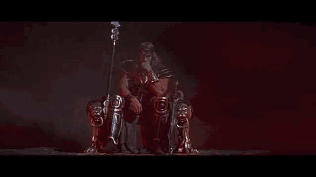 a man is sitting on a throne with a spear