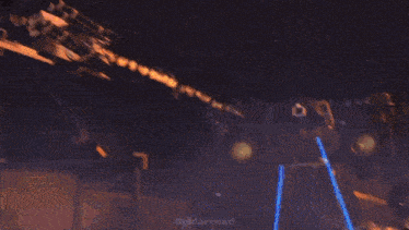 a video game is being played with a helicopter shooting fire