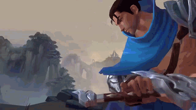 a man with a blue scarf around his head holds a sword