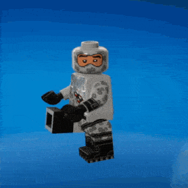 a lego figure with a helmet and goggles on stands on a blue background