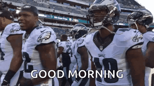 a group of football players are standing in a line with the words good morning written on the bottom .