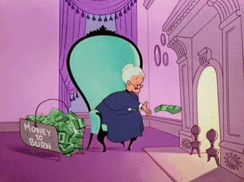 an old lady sits in a chair next to a basket of money