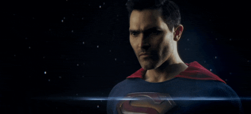 a man in a superman costume with a red cape
