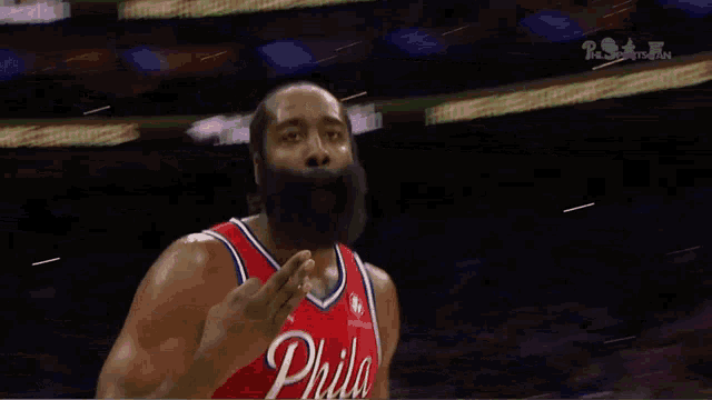 a bearded basketball player with the number 1 on his shirt