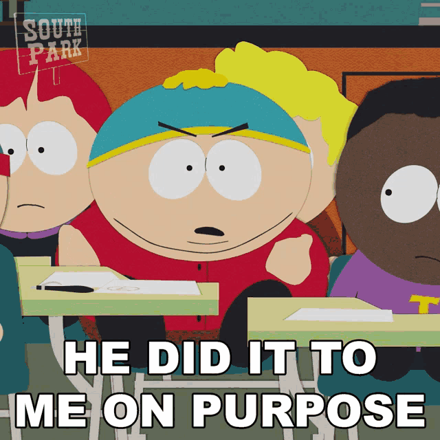 a south park cartoon shows cartman sitting at a desk with the words he did it to me on purpose