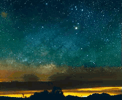 a night sky filled with lots of stars and a sunset in the background