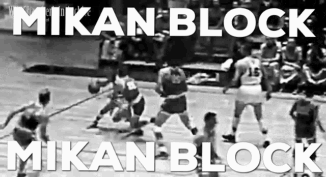 a black and white photo of a basketball game with the words mikan block