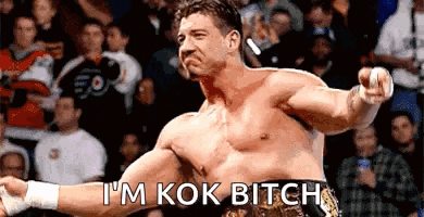 a man in a boxing ring with the words i 'm kok bitch written on the bottom