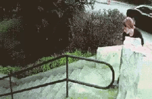 a pixelated image of a person doing a trick on a ramp with a fence in the background