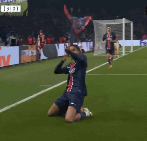 a soccer player celebrates a goal on the field with the score 310