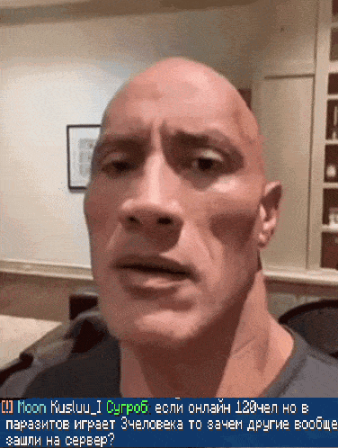 a bald man 's face is displayed in a pixelated image with a message from moon kusliuu