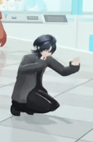 a man is kneeling down on the floor wearing a virtual reality headset