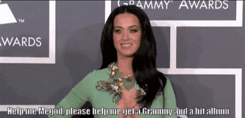 a woman on a grammy awards red carpet asking for help