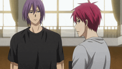 a man with purple hair and a man with red hair standing next to each other
