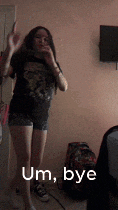 a girl dancing in a room with the words um bye written on the bottom