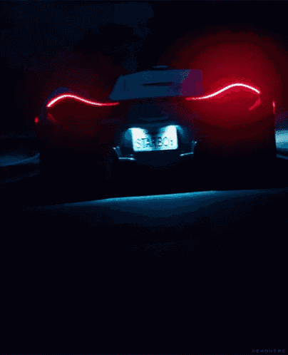 a car with a license plate that reads starboy